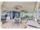 Spacious clubhouse patio with lots of seating for residents to relax and socialize at 13042 Pennybrook Dr, Riverview, FL 33579