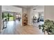 Open entryway flows into a modern living space and a bright office at 13042 Pennybrook Dr, Riverview, FL 33579