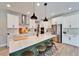 Well-appointed kitchen with stainless steel appliances, a large island, and pendant lighting at 13042 Pennybrook Dr, Riverview, FL 33579