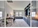 Bright office space with custom built-in bookshelves and cabinet storage at 13042 Pennybrook Dr, Riverview, FL 33579