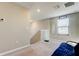 Upstairs landing area with neutral paint, carpet, and natural light at 13923 Arbor Pines Dr, Riverview, FL 33579