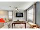 Bright living room with tile flooring, large windows and modern decor at 13923 Arbor Pines Dr, Riverview, FL 33579