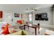 Modern living room featuring a comfortable sofa and contemporary decor at 13923 Arbor Pines Dr, Riverview, FL 33579