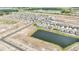New construction homes are set around a scenic pond in this vibrant residential community at 15238 Rainbow Quartz St, Wimauma, FL 33598