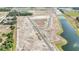 New construction home community with roads, ponds and future home sites for development at 15238 Rainbow Quartz St, Wimauma, FL 33598