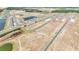 Community aerial featuring modern homes alongside serene ponds, highlighting the area's tranquil environment and desirable neighborhood layout at 15238 Rainbow Quartz St, Wimauma, FL 33598