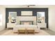 Serene bedroom features a luxurious upholstered headboard, coordinated nightstands, and an inviting ambiance at 15238 Rainbow Quartz St, Wimauma, FL 33598
