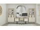 Modern home office featuring sleek desk, comfortable chair, and stylish storage solutions at 15238 Rainbow Quartz St, Wimauma, FL 33598