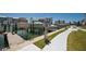 Waterfront property with boat dock, boat lift and manicured lawns at 171 Medallion Blvd # F, Madeira Beach, FL 33708