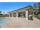View of pool pavilion with tables and chairs and access to restrooms nearby swimming pool at 17921 Nadine Pl, Nokomis, FL 34275