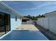 A sunny, spacious backyard with fencing and a patio, perfect for outdoor enjoyment at 195 45Th Ave, St Pete Beach, FL 33706