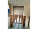 Renovations underway in this bathroom featuring tile floors and a built in shelf at 195 45Th Ave, St Pete Beach, FL 33706