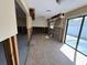 Open kitchen with room for customization and a large sliding door to the backyard at 195 45Th Ave, St Pete Beach, FL 33706