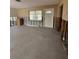 Open living space with windows, exterior door, and exposed wall studs and block construction ready for customization at 195 45Th Ave, St Pete Beach, FL 33706