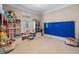Bright ' room with built-in storage, playful decor, and a large blue magnetic building block wall at 19810 Prince Benjamin Dr, Lutz, FL 33549