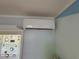 The Pioneer AC unit is installed in the room over the window providing a cool room atmosphere at 2077 Canal Dr # L35, Bradenton, FL 34207