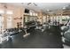 Community fitness center with cardio machines, weights, and mirrored wall at 2344 Pleasant Hill Ln, Holiday, FL 34691