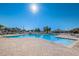 A stunning swimming pool offers a refreshing retreat with plenty of lounge seating for relaxation at 2344 Pleasant Hill Ln, Holiday, FL 34691