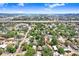 Expansive aerial view showcasing the neighborhood, nearby cityscape and the property's location at 2415 E 20Th Ave, Tampa, FL 33605
