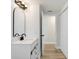 The recently renovated bathroom boasts elegant fixtures and natural light at 2415 E 20Th Ave, Tampa, FL 33605