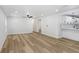 Bright and airy living room with wood floors, recessed lighting, and an open layout at 2415 E 20Th Ave, Tampa, FL 33605
