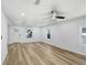 Living room boasts wood floors, recessed lights, an open layout, and lots of natural light at 2415 E 20Th Ave, Tampa, FL 33605