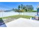 Fenced backyard featuring a concrete patio and a convenient outdoor sink area for added functionality at 2711 W Cordelia St, Tampa, FL 33607