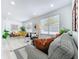 Cozy living room showcasing neutral tones, comfortable seating, and bright natural light at 2711 W Cordelia St, Tampa, FL 33607