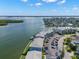 Breathtaking aerial view featuring the waterfront complex and the beautiful bay at 280 126Th Ave # 106, Treasure Island, FL 33706