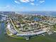 An elevated view shows the condo building's proximity to the beach and other waterfront residences at 280 126Th Ave # 106, Treasure Island, FL 33706
