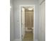 Hallway view into bathroom with shower and tub combination at 280 126Th Ave # 106, Treasure Island, FL 33706