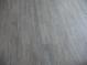 Durable and modern gray wood flooring at 280 126Th Ave # 106, Treasure Island, FL 33706