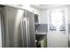 The kitchen features stainless steel appliances and modern amenities, perfect for culinary endeavors and convenience at 280 126Th Ave # 106, Treasure Island, FL 33706