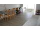 Inviting living space with a view into the sunroom, creating a warm and seamless transition between rooms at 280 126Th Ave # 106, Treasure Island, FL 33706