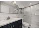 Bathroom featuring new vanity, shower and modern fixtures at 3500 Gussie St, Punta Gorda, FL 33950