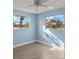 Cozy bedroom features wood floors and ample natural light at 3500 Gussie St, Punta Gorda, FL 33950