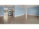 Spacious living area featuring tile floors and a view into the kitchen, promoting an open layout at 3500 Gussie St, Punta Gorda, FL 33950