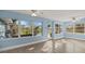 Cozy sun room with bright tile floors and many windows to let the sunlight in at 3500 Gussie St, Punta Gorda, FL 33950
