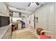 Bedroom with built-in storage, wood floors, and a cozy seating area at 36750 Us 19 N # 22212, Palm Harbor, FL 34684