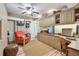 Bedroom with lots of storage, wood floors, and a cozy red chair at 36750 Us 19 N # 22212, Palm Harbor, FL 34684
