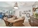 Cozy dining room with decorative accents and lovely chandelier at 36750 Us 19 N # 22212, Palm Harbor, FL 34684