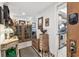 Inviting foyer featuring tile floors, decorative furnishings, and a glimpse into the kitchen at 36750 Us 19 N # 22212, Palm Harbor, FL 34684