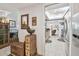 Inviting foyer featuring tile floors, decorative furnishings, and a glimpse into the kitchen and breakfast nook at 36750 Us 19 N # 22212, Palm Harbor, FL 34684