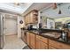 A view of the kitchen featuring stainless appliances and tile flooring at 36750 Us 19 N # 22212, Palm Harbor, FL 34684