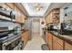 Charming kitchen features stainless steel appliances and ample cabinet space at 36750 Us 19 N # 22212, Palm Harbor, FL 34684