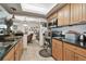 Bright kitchen features stainless steel appliances and tile floors at 36750 Us 19 N # 22212, Palm Harbor, FL 34684