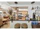 Kitchen view features a bar countertop with stools and modern stainless steel appliances at 36750 Us 19 N # 22212, Palm Harbor, FL 34684