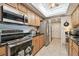Eat in kitchen features stainless steel appliances and ample storage at 36750 Us 19 N # 22212, Palm Harbor, FL 34684