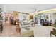 Bright living room with sliding glass door leading to outdoor patio at 36750 Us 19 N # 22212, Palm Harbor, FL 34684