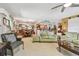 Open concept layout combining the living room, dining area, and kitchen at 36750 Us 19 N # 22212, Palm Harbor, FL 34684